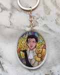 Keychain of Claude of Fire emblem on a stone background.