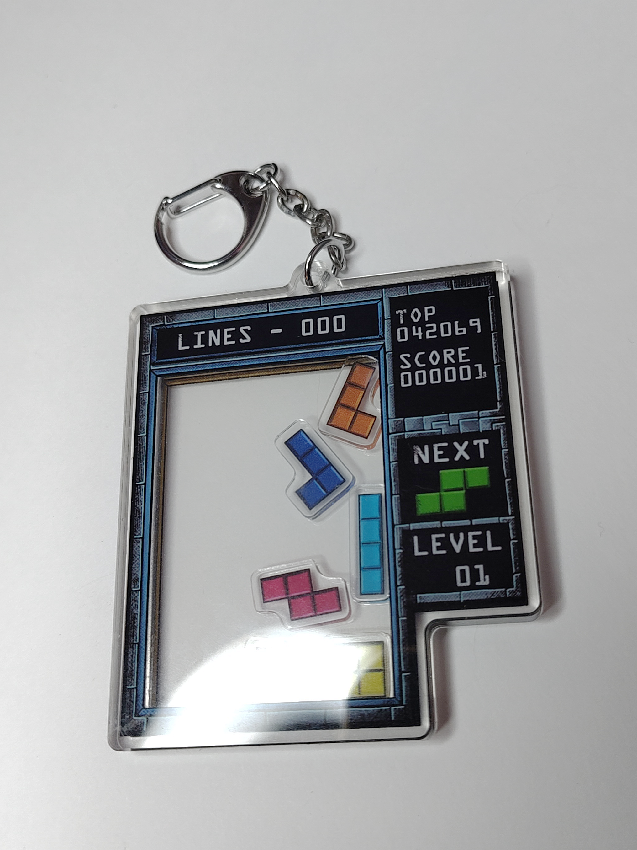 Tetris Shaker Charm - double-sided acrylic keychain with Tetrominos inside